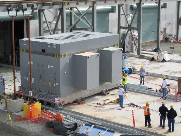 In 2012, a Low-Activity Waste Facility melter is pulled out of the building on rails for inspection. The melter will be one of two used to heat Hanford’s underground low-activity tank waste and glass-forming materials to 2,100 degrees Fahrenheit before the mixture is poured into stainless steel containers for permanent storage in a process called vitrification.