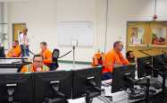 Workers safely monitor systems at the Hanford Vitrification Plant from inside a computerized control room in the recently completed annex of the plant’s Low-Activity Waste facility. 